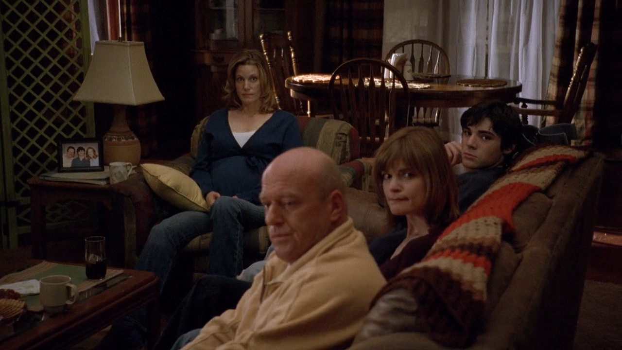 Walt comes home to find his family sitting around his living room