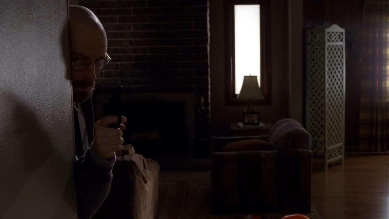 Walt searches his house for Jesse