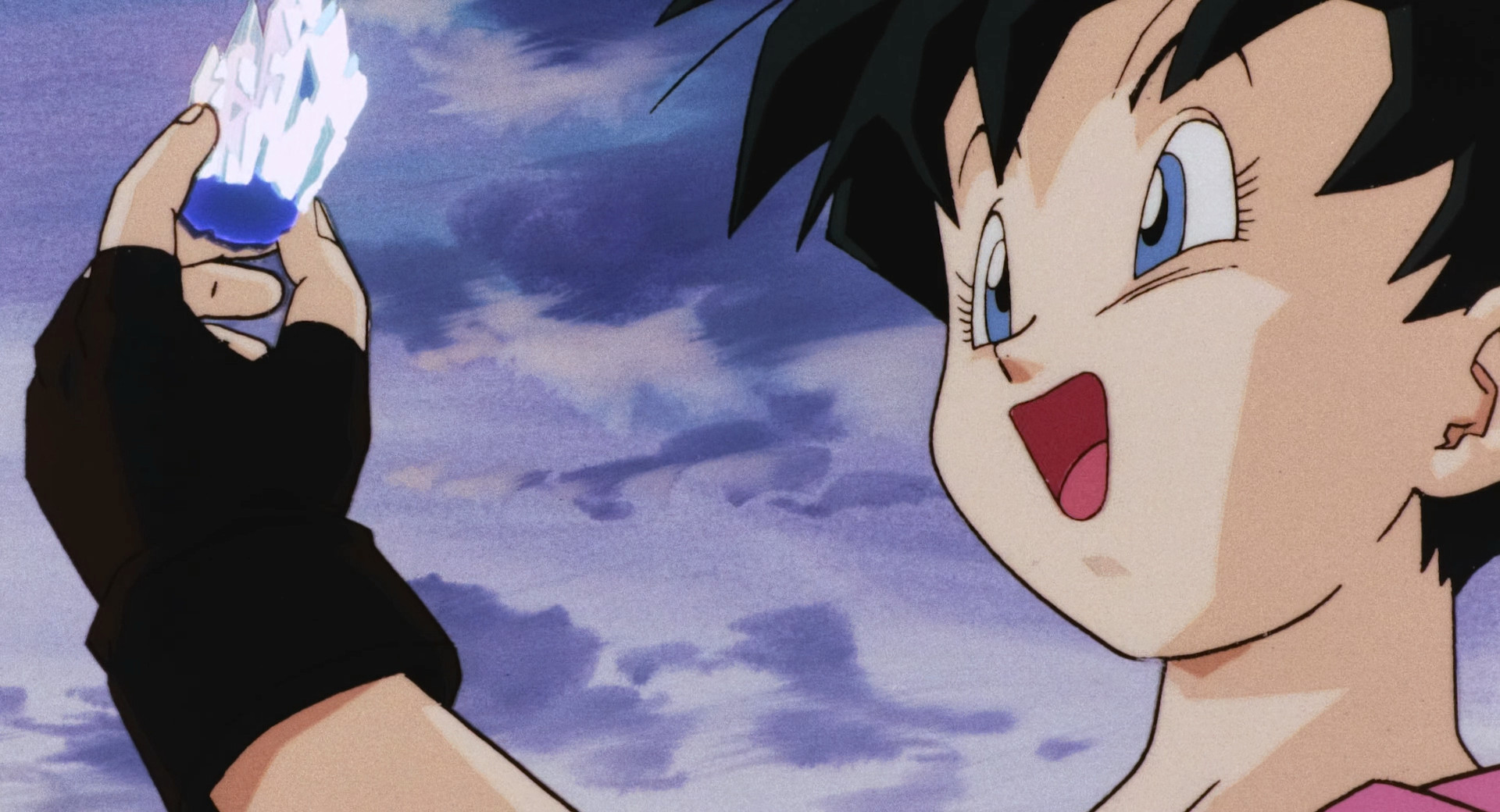 Videl looks at a crystal from the lake