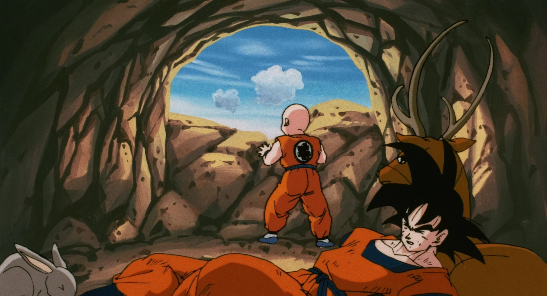 Goku is surrounded by animals while he recuperates in a cave